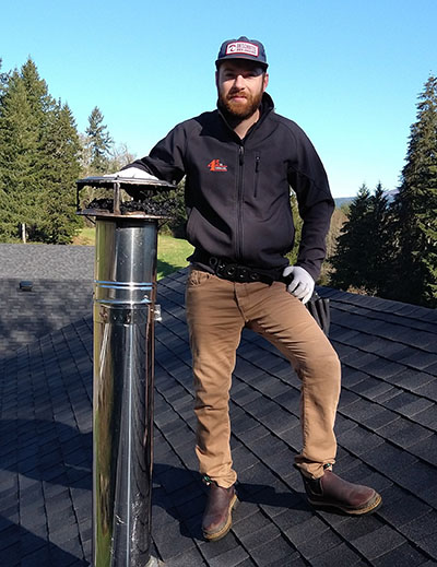A 45th Parallel Home Inspection tech on a roof to illustrate Longview home inspections.